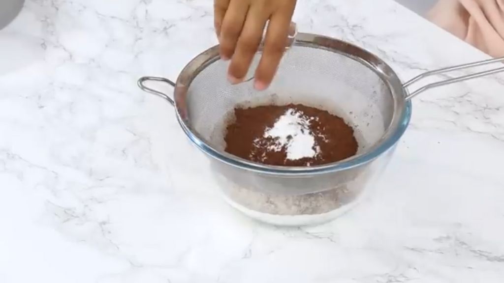 Add cocoa powder and sugar