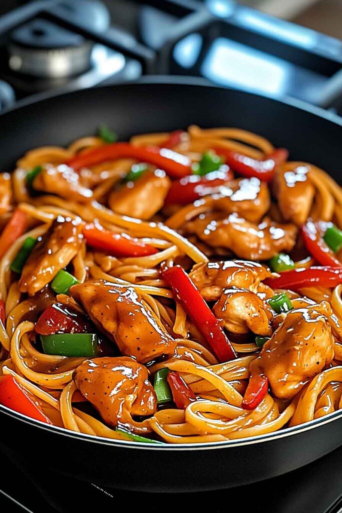 One Skillet Sweet Spicy Sticky Chicken Pasta
